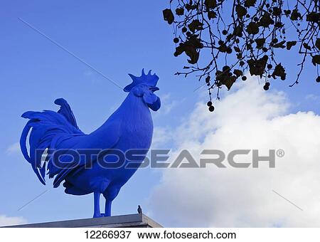 Hahn/Cock, the sculpture of a giant blue cockerel by the German artist Katharina Fritsch, Trafalgar Square, Westminster; London, England View Large Photo Image Stock Photo - Hahn/Cock, the sculpture of a giant blue cockerel by the German artist Katharina Fritsch, Trafalgar Square, Westminster; London, England. Fotosearch