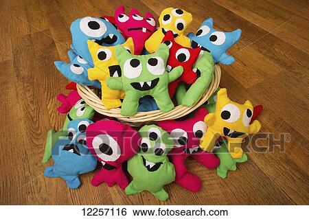 Hand-made stuffed monster dolls View Large Photo Image Stock Photograph - Hand-made stuffed monster dolls. Fotosearch