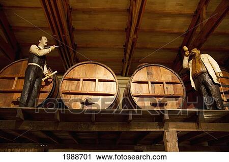 Stock Image - Handcrafted Wooden Figures, On Display At The Wine Museum Of Estancia El Cuadro, Casablanca Valley, Valparaiso Region, Chile. Fotosearch