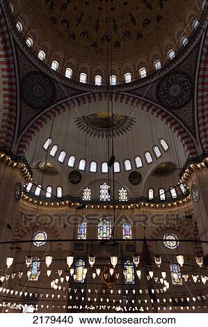 Stock Image - Hanging Light Fixture And Dome Ceilings; Istanbul Turkey. Fotosearch