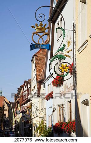 Hanging Sign With Blossoming Flowers In Window Planter Boxes; Rothenburg Ob Der Tauber Bavaria Germany View Large Photo Image Stock Photograph - Hanging Sign With Blossoming Flowers In Window Planter Boxes; Rothenburg Ob Der Tauber Bavaria Germany. Fotosearch