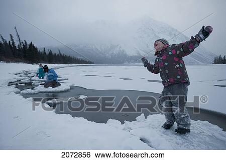 Happy Girl On Ice Floe Of Freezing Lake, Kathleen Lake, Kluane National Park, Yukon Territory, Canada View Large Photo Image Stock Photograph - Happy Girl On Ice Floe Of Freezing Lake, Kathleen Lake, Kluane National Park, Yukon Territory, Canada. Fotosearch