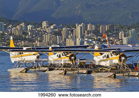 Stock Image - Harbor Air Floatplanes At Vancouver Harbor Water Airport, Vancouver, British Columbia, Canada. Fotosearch