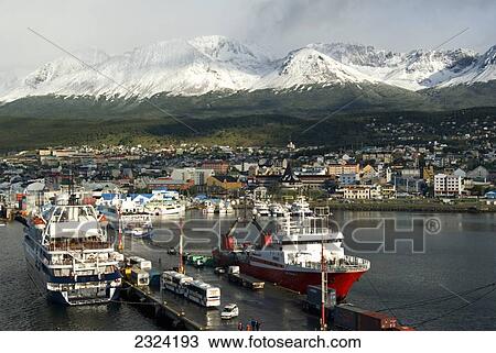 Harbour and city with snow-covered Andes Mountains from deck of cruise ship; Usauaia, Argentina View Large Photo Image Stock Image - Harbour and city with snow-covered Andes Mountains from deck of cruise ship; Usauaia, Argentina. Fotosearch