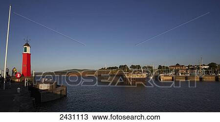 Harbour and lighthouse; Watchet, Somerset, England View Large Photo Image Stock Image - Harbour and lighthouse; Watchet, Somerset, England. Fotosearch