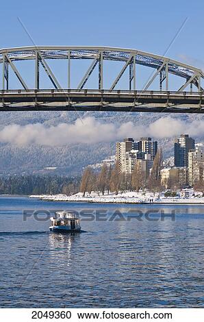 Harbour Taxi Going Under Burrard Street Bridge After Snowfall, Vancouver, British Columbia View Large Photo Image Stock Image - Harbour Taxi Going Under Burrard Street Bridge After Snowfall, Vancouver, British Columbia. Fotosearch