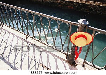 Stock Photo - Hat On Canal Railings. Fotosearch