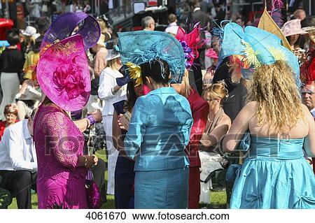 Hats and fashionable clothes at new Grandstand Enclosure during Royal Ascot horse racing meeting; Berkshire, England View Large Photo Image Stock Image - Hats and fashionable clothes at new Grandstand Enclosure during Royal Ascot horse racing meeting; Berkshire, England. Fotosearch