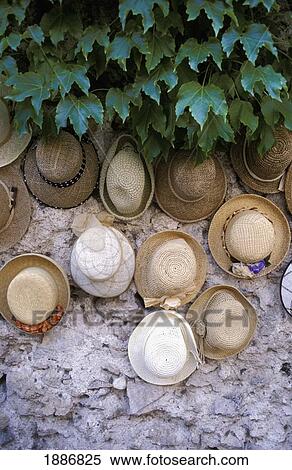 Stock Photography - Hats Hanging Outside Hat Shop. Fotosearch