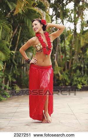 Hawaii, A Local Hawaiian Woman Wearing A Red Lei And Dancing The Hula. View Large Photo Image Stock Image - Hawaii, A Local Hawaiian Woman Wearing A Red Lei And Dancing The Hula.. Fotosearch