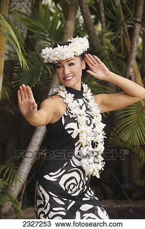 Hawaii, A Local Hawaiian Woman Wearing A Lei And Dancing The Hula. View Large Photo Image Stock Image - Hawaii, A Local Hawaiian Woman Wearing A Lei And Dancing The Hula.. Fotosearch