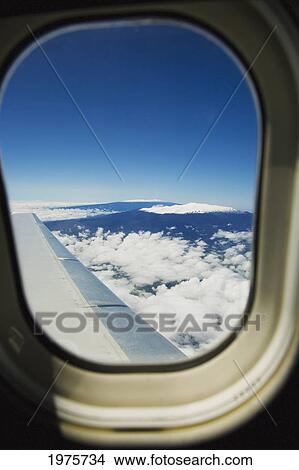 Hawaii, Big Island, Aerial View Of Mauna Kea And Mauna Loa Covered In Snow Through An Airplane Window. View Large Photo Image Picture - Hawaii, Big Island, Aerial View Of Mauna Kea And Mauna Loa Covered In Snow Through An Airplane Window.. Fotosearch