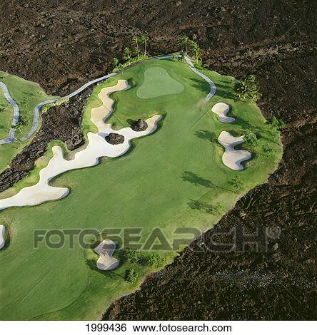 Hawaii, Big Island, Aerial View Of Waikoloa Resort Hole #5 Surrounded By Lava Field C1297 View Large Photo Image Stock Photograph - Hawaii, Big Island, Aerial View Of Waikoloa Resort Hole #5 Surrounded By Lava Field C1297. Fotosearch