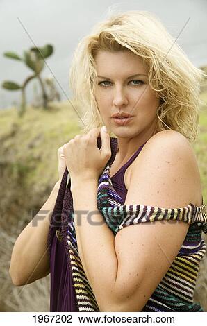 Stock Image - Hawaii, Big Island, Beautiful Woman In Outdoor Setting.. Fotosearch
