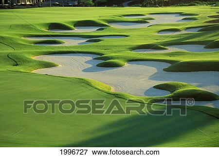 Stock Photo - Hawaii, Big Island, Four Seasons Resort Golf Course 18Th Hole With Many Sand Traps, Design Hualalai. Fotosearch