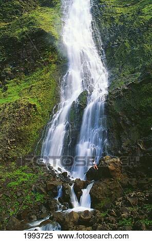 Hawaii, Big Island, Hamakua, Waipio Valley, Kaluahine Falls, Girl On Rocks View Large Photo Image Stock Photography - Hawaii, Big Island, Hamakua, Waipio Valley, Kaluahine Falls, Girl On Rocks. Fotosearch
