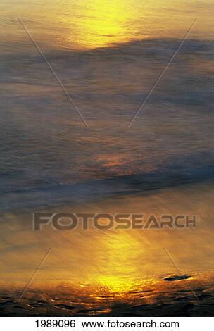 Hawaii, Big Island, Hapuna Bay, Golden Light Refliecting On Ocean Surface View Large Photo Image Stock Photograph - Hawaii, Big Island, Hapuna Bay, Golden Light Refliecting On Ocean Surface. Fotosearch
