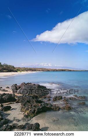 Stock Image - Hawaii, Big Island, Hapuna Beach Park, Rocky Shore And Clear Blue Water.. Fotosearch