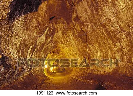 Stock Image - Hawaii, Big Island, Hawaii Volcanoes National Park, Interior Of Thurston Lava Tube, Illuminated By Lights. Fotosearch