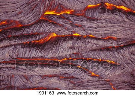 Stock Image - Hawaii, Big Island, Hawaii Volcanoes National Park, Pahoehoe Lava, Extreme Close-Up, Layered Texture Glowing In Between. Fotosearch
