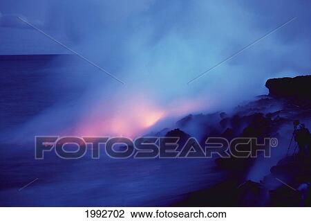 Hawaii, Big Island, Hawaii Volcanoes National Park, Lava Flows Into Ocean At Twilight, Creating A Purple Mist. View Large Photo Image Stock Image - Hawaii, Big Island, Hawaii Volcanoes National Park, Lava Flows Into Ocean At Twilight, Creating A Purple Mist.. Fotosearch