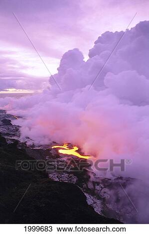 Stock Image - Hawaii, Big Island, Hawaii Volcanoes National Park, Lava Entering Ocean At Dawn, Purple Smoke Billows C1632. Fotosearch