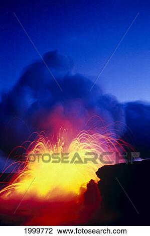Stock Image - Hawaii, Big Island, Hawaii Volcanoes National Park, Lava Explodes As Flow Hits Ocean, Fountain Bright Blue Sky C1634. Fotosearch