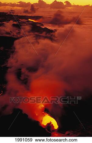 Hawaii, Big Island, Hawaii Volcanoes National Park, Lava Flowing In To Sea, Kilauea Volcano View Large Photo Image Stock Photo - Hawaii, Big Island, Hawaii Volcanoes National Park, Lava Flowing In To Sea, Kilauea Volcano. Fotosearch