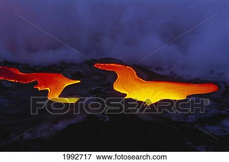 Stock Photo - Hawaii, Big Island, Hawaii Volcanoes National Park, Pahoehoe Glowing Lava Flow, River Like Smoke In Background.. Fotosearch