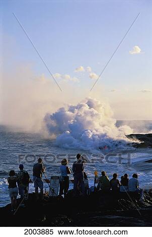 Hawaii, Big Island, Hawaii Volcanoes National Park, Group Of Visitors Watch Lava Flow Into Ocean, Smoke Distance East Kupapa'u Kalapana View Large Photo Image Stock Photography - Hawaii, Big Island, Hawaii Volcanoes National Park, Group Of Visitors Watch Lava Flow Into Ocean, Smoke Distance East Kupapa'u Kalapana. Fotosearch