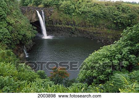 Hawaii, Big Island, Hilo Lush Green View Of Rainbow Falls At Wailuku River State Park View Large Photo Image Stock Photo - Hawaii, Big Island, Hilo Lush Green View Of Rainbow Falls At Wailuku River State Park. Fotosearch