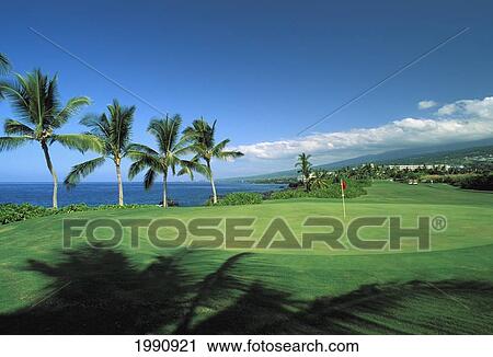 Stock Image - Hawaii, Big Island, Kailua-Kona, Kona Country Club Golf Course, Ocean Front. Fotosearch