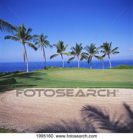 Stock Image - Hawaii, Big Island, Kailua-Kona, Kona Country Club Golf Course, Ocean Front.. Fotosearch