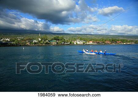 Hawaii, Big Island, Kailua-Kona Town, Six Man Canoe Paddling Along Coastline Near Ali'i Drive. View Large Photo Image Stock Photo - Hawaii, Big Island, Kailua-Kona Town, Six Man Canoe Paddling Along Coastline Near Ali'i Drive.. Fotosearch