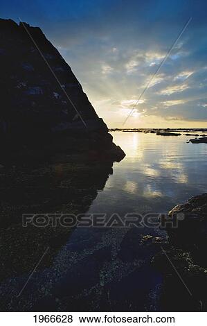 Stock Photo - Hawaii, Big Island, Keauhou, Sunset Over Ke'eku Heiau, High Tide.. Fotosearch
