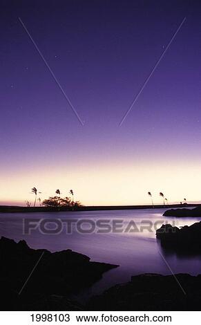 Stock Image - Hawaii, Big Island, Kiholo Bay, Purple Sunset.. Fotosearch