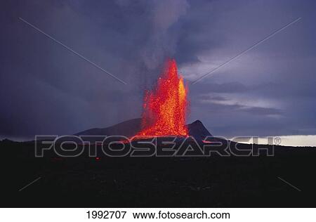 Stock Photo - Hawaii, Big Island, Kilauea Volcano, Volcanic Eruption Spurts Hot Lava Into The Air.. Fotosearch