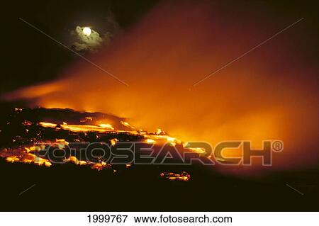 Stock Photo - Hawaii, Big Island, Kilauea Volcano, Lava Flows Into Ocean, Full Moon, Orange Skies C1628. Fotosearch