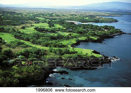 Stock Photograph - Hawaii, Big Island, Kohala Coast, Mauna Kea Beach Resort Golf Course, Aerial View. Fotosearch