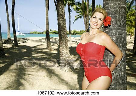 Hawaii, Big Island, Kona, Beautiful Woman On Beach Wearing Red Swimsuit. View Large Photo Image Stock Image - Hawaii, Big Island, Kona, Beautiful Woman On Beach Wearing Red Swimsuit.. Fotosearch