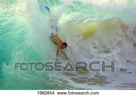 Hawaii, Big Island, Kona, Bodysurfer Riding A Large Wave. View Large Photo Image Picture - Hawaii, Big Island, Kona, Bodysurfer Riding A Large Wave.. Fotosearch