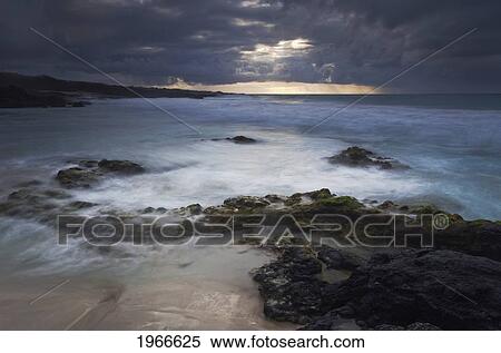 Stock Photography - Hawaii, Big Island, Kona Coast, Kua Bay, Long Exposure Over Stormy Surf.. Fotosearch