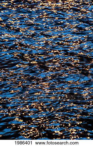Hawaii, Big Island, Kona Coast, Wave Patterns Reflecting The Sunset. View Large Photo Image Stock Image - Hawaii, Big Island, Kona Coast, Wave Patterns Reflecting The Sunset.. Fotosearch
