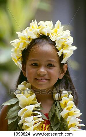 Picture - Hawaii, Big Island, Kona, Young Girl With Plumeria Leis Portrait Smiling, B1368. Fotosearch