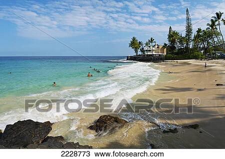 Stock Image - Hawaii, Big Island, Magic Sands Beach Park, Locals And Tourists Alike Cool Down On A Hot Summer Day.. Fotosearch
