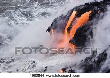 Picture - Hawaii, Big Island, Near Kalapana, Pahoehoe Lava Flowing From Kilauea Into Frothy Pacific Ocean.. Fotosearch