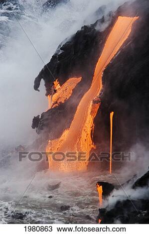 Stock Image - Hawaii, Big Island, Near Kalapana, Pahoehoe Lava Flowing From Kilauea Into Pacific Ocean, Steam Rising.. Fotosearch