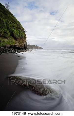 Stock Photo - Hawaii, Big Island, North Kohala, Pololu, Black Sand Beach.. Fotosearch