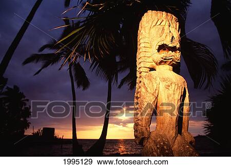 Stock Photo - Hawaii, Big Island, Place Of Refuge Pu'uhonua O Honaunau Close-Up Ohia Wood Ki'i Religious Carvings At Sunset.. Fotosearch