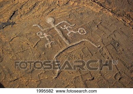 Stock Image - Hawaii, Big Island, Puako Petroglyphs, Closeup Of Carving. Fotosearch
